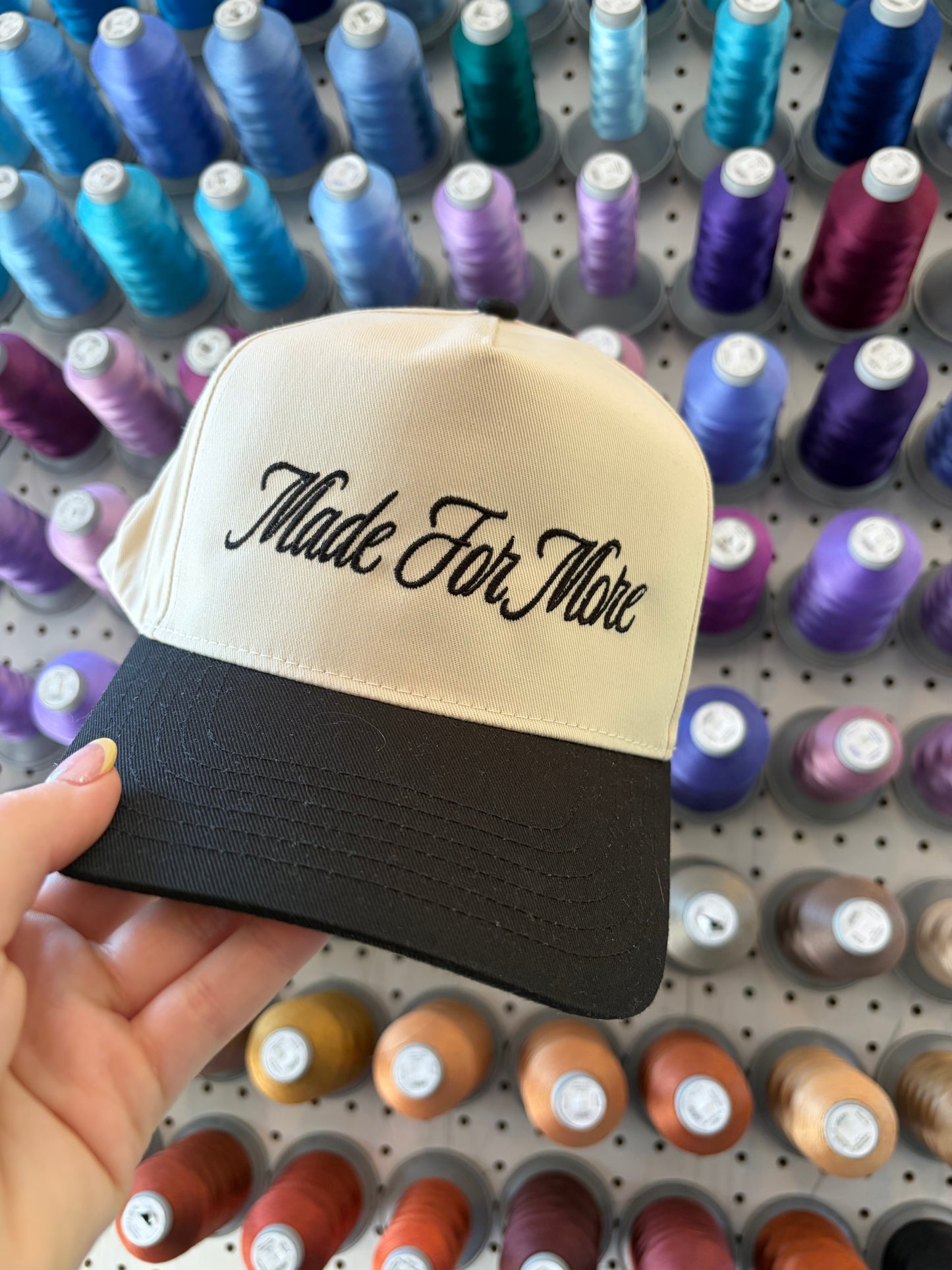 Black Made for more Trucker Hat