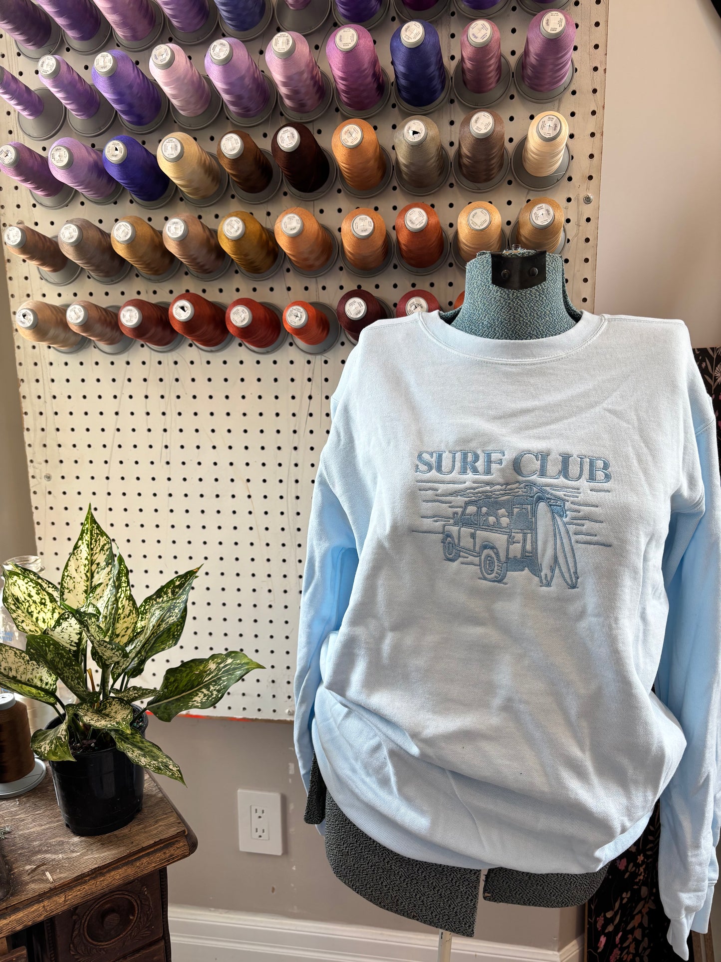Small blue surf club crew