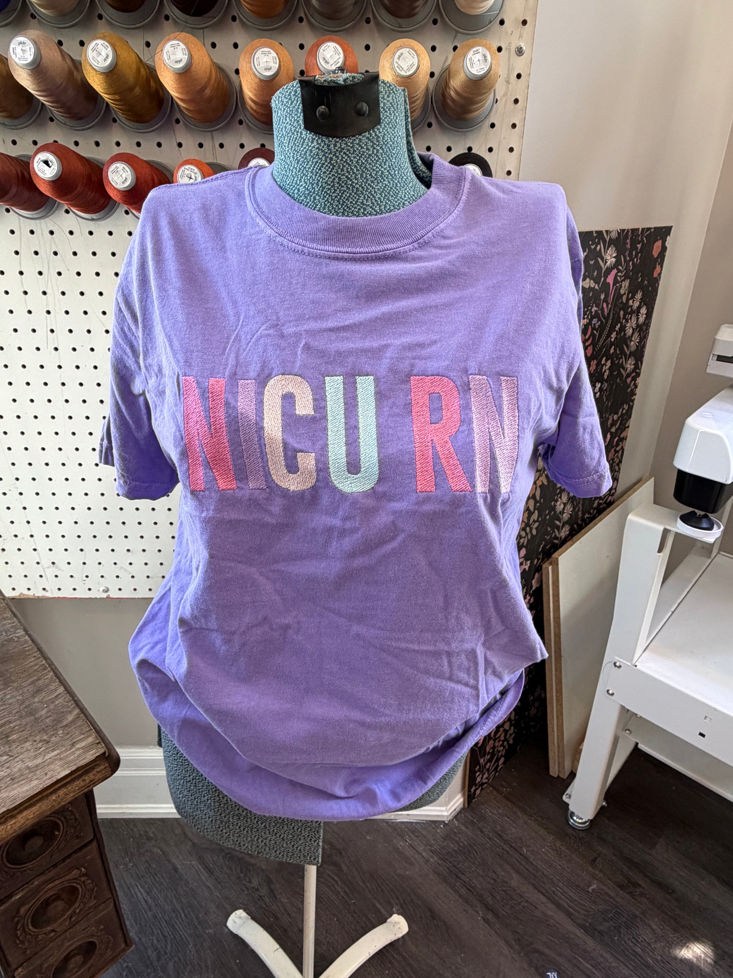 Small violet NICU RN tee